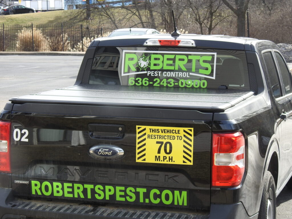 A Roberts Pest Control service vehicle on the road, serving residential and commercial pest control needs in Arnold, Festus, and St. Charles, MO.